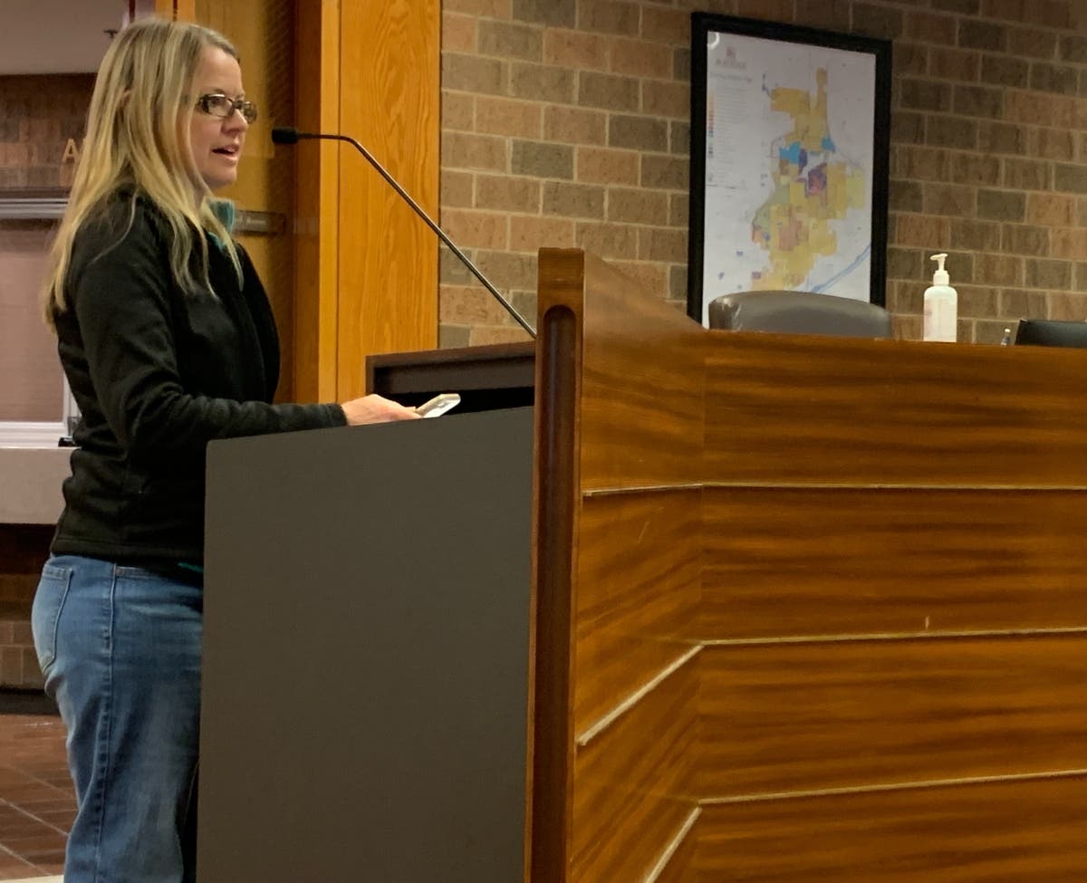 Burr Ridge resident Holly Adkins tells a village committee on Wednesday that a planned industrial development would be "completely overwhelming."