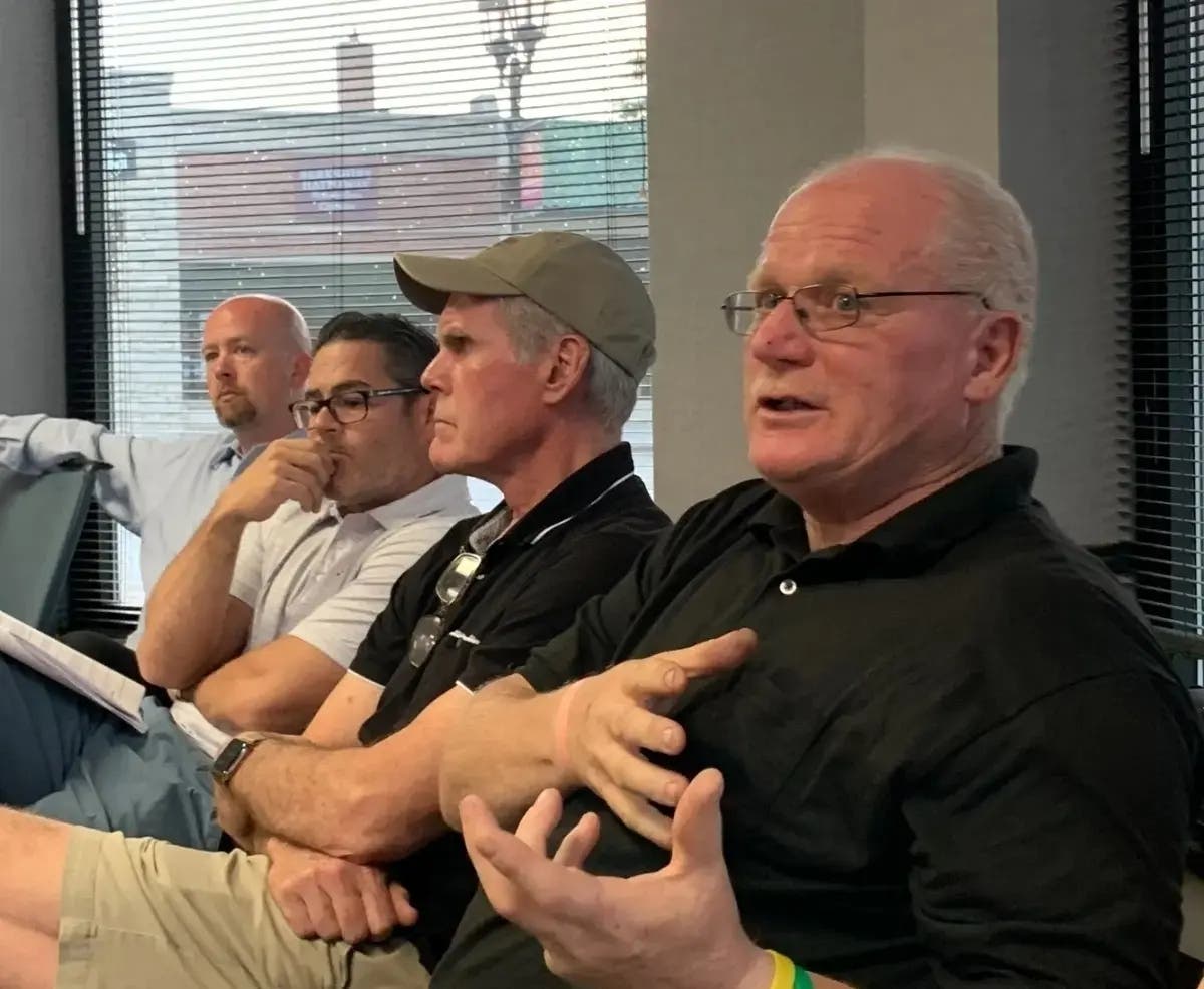 John Pembroke, an Elmhurst resident and owner of Island Construction, makes the case in 2022 for his proposed townhome development on Lake Street. 