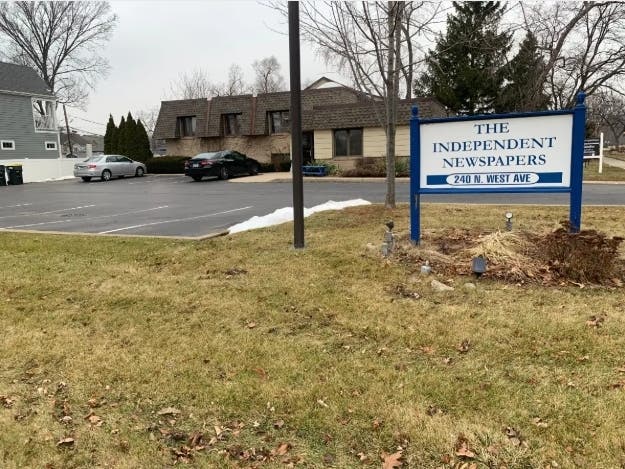 The Independent Newspapers building would be demolished to make way for townhomes under a developer's proposal. Elmhurst officials are considering it. 