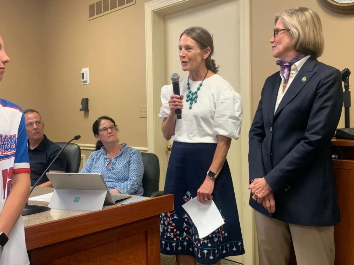 State Rep. Marti Deuter (left), an Elmhurst Democrat, speaks in September at a Clarendon Hills Village Board meeting. Next to her is state Sen. Suzy Glowiak Hilton, a Western Springs Democrat.