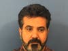 Pezhman Gilani Yahyavi, 46, of Glendale Heights, was arrested on a charge of felony disorderly conduct by filing a false crime report, police said.