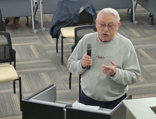 Western Springs resident Jerry Jerabek speaks Monday about safety issues at 47th Street and Wolf Road. 