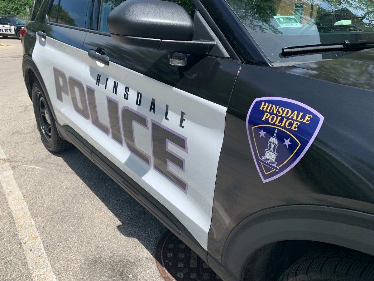 A 27-year-old Justice woman was arrested after Hinsdale police were called to a local gym, authorities said. 