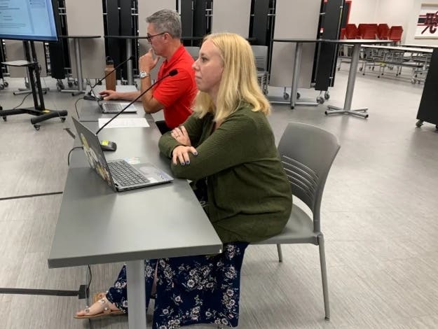 Hinsdale South Principal Kari Peronto was singled out for praise at Thursday's school board meeting. She appeared here last summer with Central's principal, Bill Walsh.