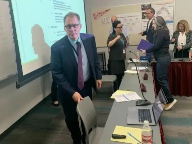 Michael Lach, superintendent for Hinsdale High School District 86, is at a board meeting in early May 2025. He is retiring June 30.