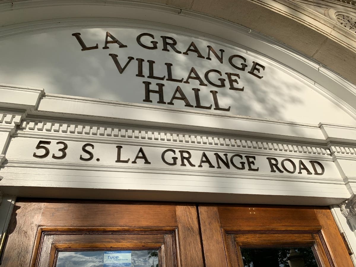 La Grange resident Jonathan Robinson sued the village this month over its approval of a condo development next to his house. 