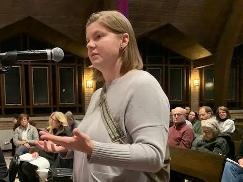 Clarendon Hills resident Laura Donnelly spoke in favor of a plaza in March at a Village Board meeting. A village survey indicated most residents opposed the idea. 
