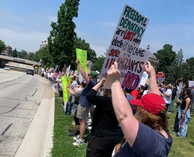 A "No Kings" rally protesting Donald Trump was held last June in Elmhurst. A Hinsdale critic of Trump was charged recently.