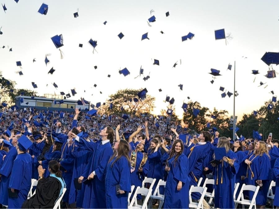 Lyons Township High School graduates threw up their caps at the end of Wednesday's commencement ceremony. 