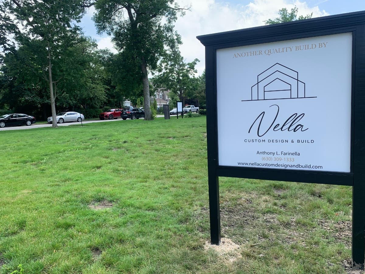 Signs for Nella Custom Design & Build recently appeared on the vacant lot at 292 S. Arlington Ave. Two years ago, a historic house on the property was demolished. 