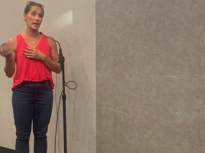 Jessica Raun, a parent of twins at Salt Creek Elementary School on Elmhurst's Riverside Drive, objects to a proposed nearby warehouse Monday. She joined many others. An Elmhurst panel recommended the project.