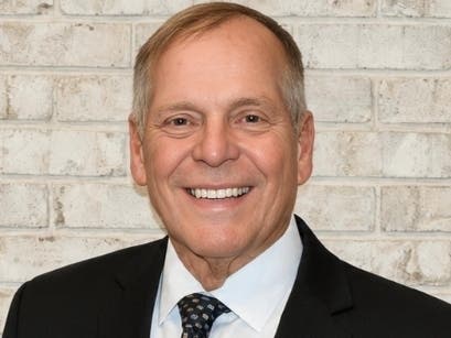 Elmhurst resident Brent Johnston, a retired teacher and coach at Hinsdale Central High School, is set to be honored by the school's foundation. 
