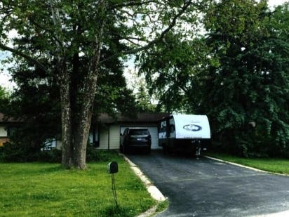 An RV is parked in the driveway at a house in the 1000 block of Juniper Lane, which violates the local code, according to the city.