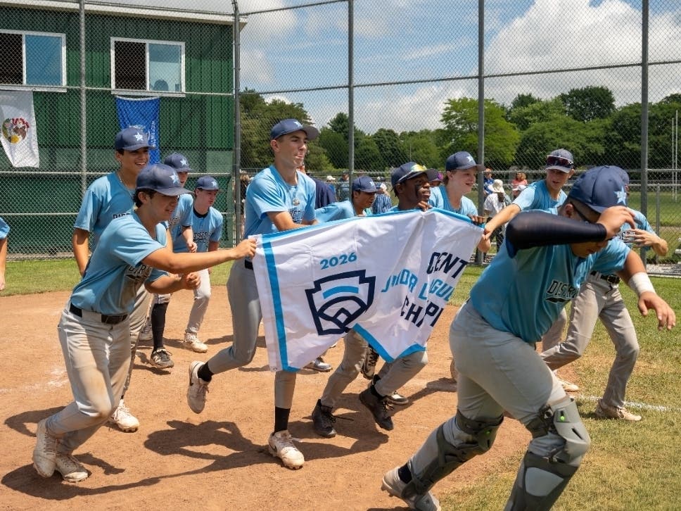 Elmhurst and River Forest's District 10 Junior League team celebrates a victory.