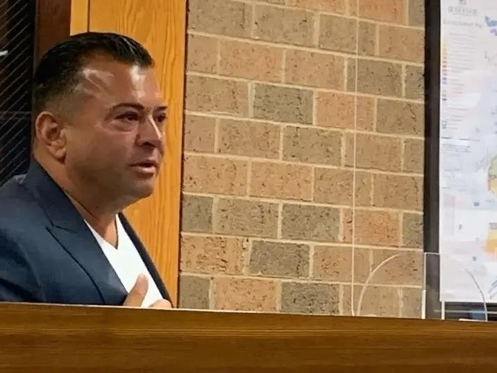 Filippo "Gigi" Rovito, owner of Capri Ristorante, speaks to the Burr Ridge Village Board in 2021. These days, Rovito faces a federal gambling case.