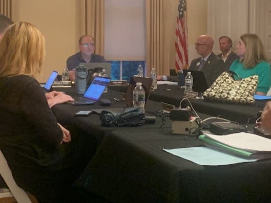 Kevin Graf, president of the Elmhurst Park District board, is at the head of the table at Monday's meeting. He was part of a board majority that rejected putting a question about a proposed bandshell's location on the November ballot.