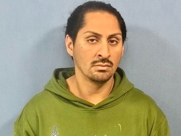 Edgar U. Pedraza-Perez, 29, of Elmhurst, was charged with aggravated assault with a deadly weapon, aggravated unlawful possession of a firearm by a felon and possession with intent to deliver cocaine, police said.