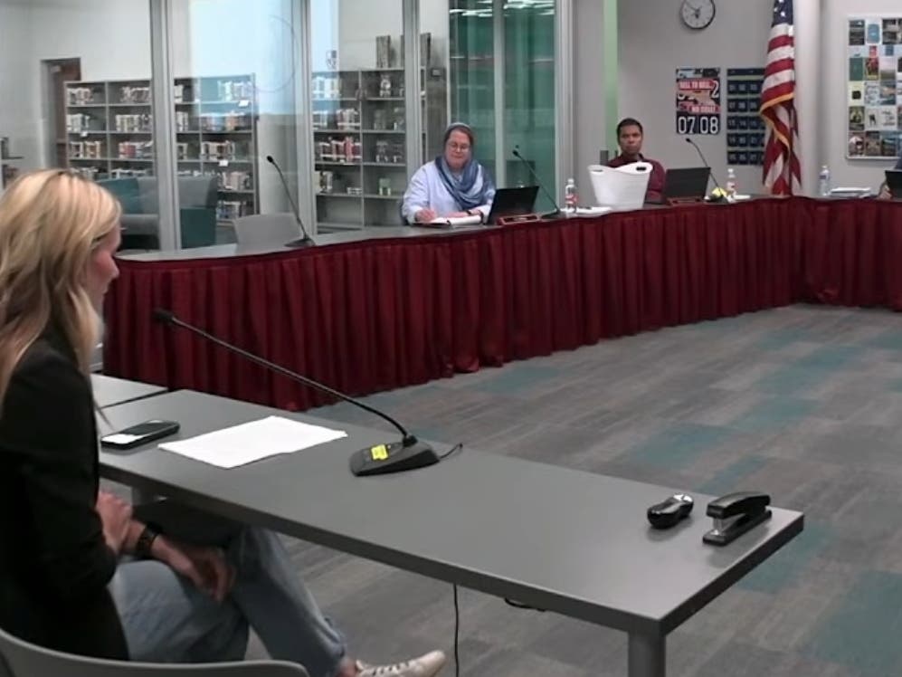 Hinsdale South parent Heather Ruff addresses the Hinsdale High School District 86 board on Tuesday. She asked the district to improve South's athletic facilities. 