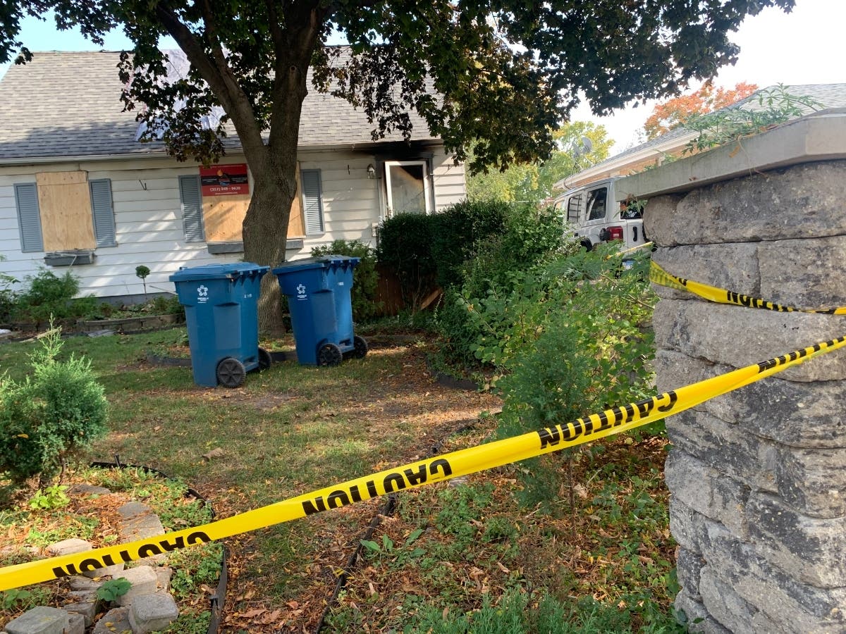 The windows of the house at 471 N. Van Auken St. were boarded up after a fire Friday morning. The resident has been arrested repeatedly.