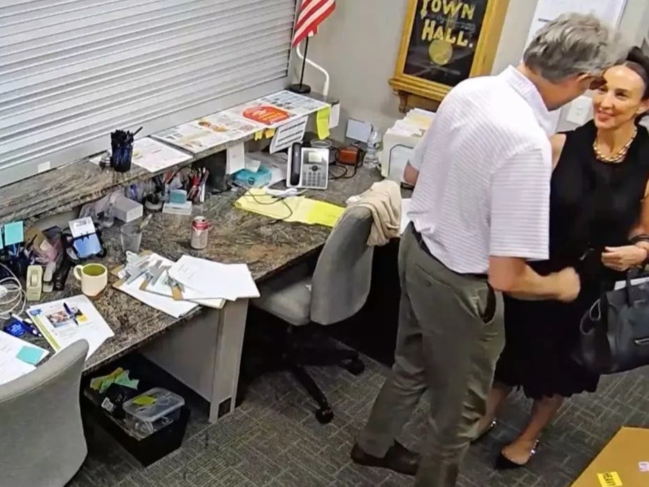 Bridgeview Mayor Steve Landek is seen in a July video kissing Lyons Township's elected clerk, Elyse Hoffenberg. The controversy over the video has now reached a court.