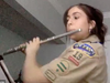 Star Scout, Keira Lowden, plays ‘Boy Scout’s Parade March’ from 1912 in memory of the late St. Rose of Lima Church Scoutmaster Ken Fineran.