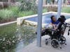 An ALEH Negev resident has respite at the specially designed sensory garden