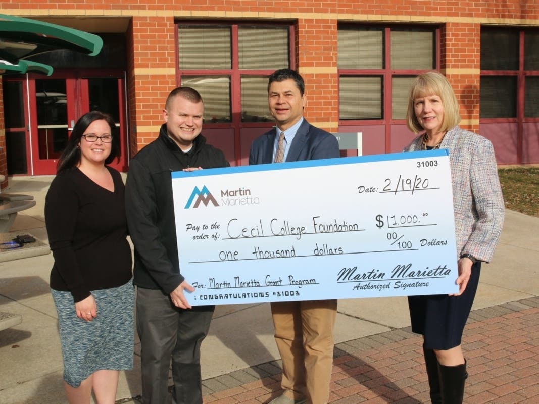 Seen here: Associate Director of Cecil College Foundation and Alumni Development, Senior Sales Representative for Martin Marietta Sean Jamison, Dean of Arts, Humanities and Commerce Jonathan Esser, and Cecil College President Dr. Mary Way Bolt.