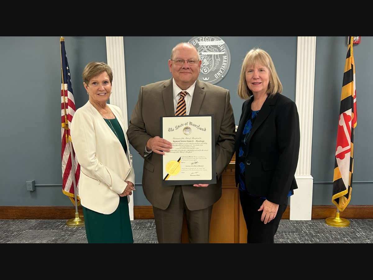 Pictured from left are Trustee Kathleen Kunda, Trustee Raymond W. Hamm, and Dr. Mary Way Bolt.