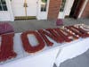 Iona partnered with DeCicco & Sons –a local, family-owned supermarket, bakery and catering company – to create 350 customized pull-apart cupcakes for the celebration. 