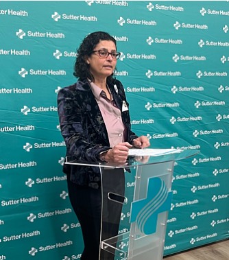 Arzou Ahsan, M.D., President and CEO of Sutter East Bay Medical Group, speaks during the event.
