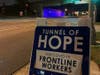 The city has erected signs around the location stating "Tunnel of Hope for COVID Frontline Workers."