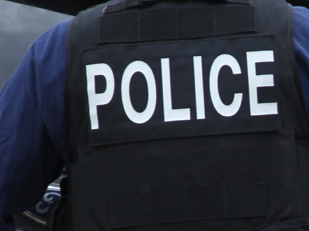 A Palm Springs police officer shot the defendant once, resulting in a non-life-threatening injury.