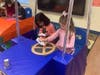 With the theme of Looking Back, Moving Forward, The Goddard School in Herndon​ students compared past and present cars.