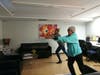 Being stuck inside due to the coronavirus doesn't mean you can't stay fit. These two residents practice tai chi. 