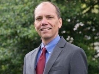 Erik Gutshall, who was elected to the Arlington County Board in 2017, announced that he was stepping down on Monday.