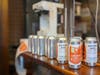 To weather the coronavirus pandemic, Lake Anne Brew House in Reston is filling cans of beer for carryout sales.