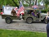 The local Veterans of Foreign Wars drove by Robert Shawn's house in a WWII jeep.