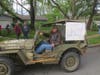This well-wisher drove an Army jeep in the parade.