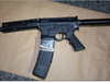 Police recovered two weapons that had been in the possession of the suspect charged in Monday's carjacking.