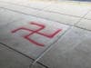 Vandals spray-painted swastikas on the sidewalks of the North Point Shopping Center in Reston early Wednesday morning.