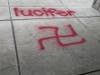 Vandals spray-painted swastikas on the sidewalks of the North Point Shopping Center in Reston early Wednesday morning.