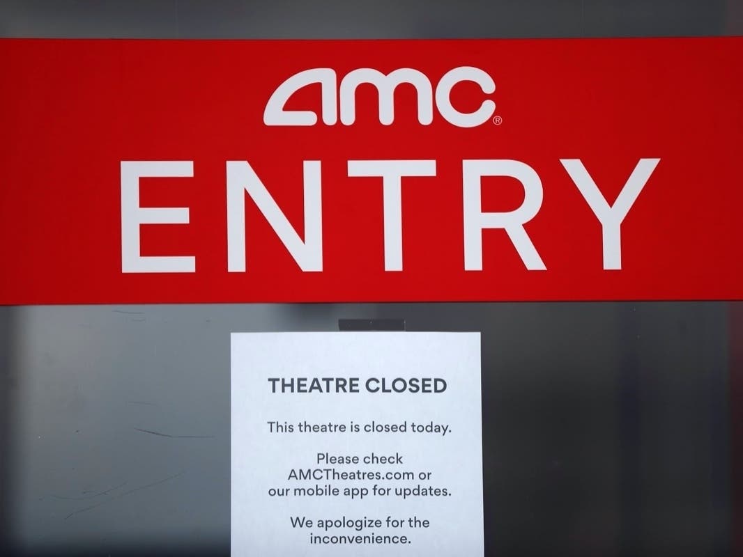 AMC reported a devastating $2.2 billion loss in the first quarter but plans to reopen ahead of the release of two major movie blockbusters. 