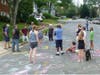Neighbors offer support to Arlington County family who saw their daughter's Black Lives Matter chalk art power-washed away by county employees.