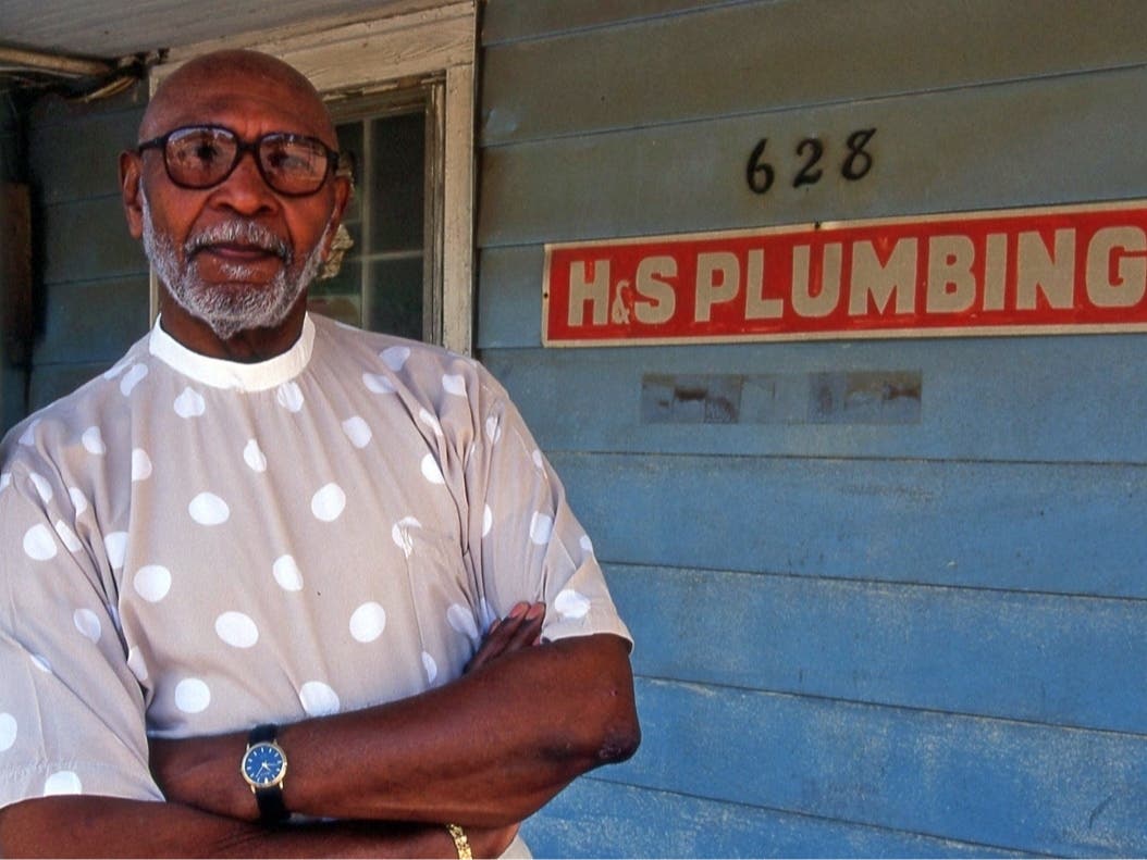 Frederick Washington by his former Herndon home, 2001.