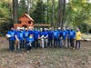 Volunteers from Dominion Energy and The Roc Solid foundation install a playset for Sonja Snell, a 3-year-old Reston girl diagnosed with leukemia.