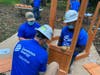 A group of volunteers from Dominion Energy built a playset Friday for 3-year-old Sonja Snell, who was diagnosed with leukemia.