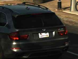 D.C. homicide detectives released surveillance photos of a 2011 dark colored BMW X5 SUV, which they say is connected to the Dec. 2 fatal shooting of Carmelo Duncan.