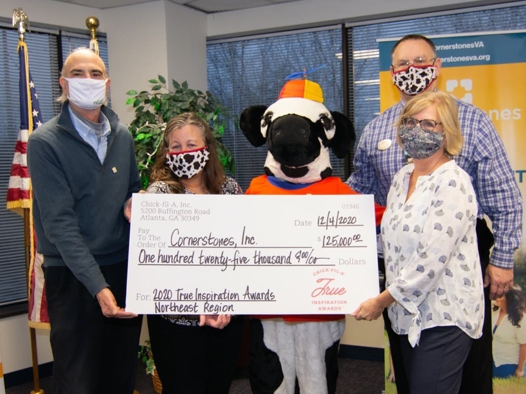 From left, Larry Schwartz, chairman of Cornerstones' Board of Directors; Andrea and Larry Everett, owners and operators, Chick-fil-A North Point Village; Kerry Wilson, CEO of Cornerstones.