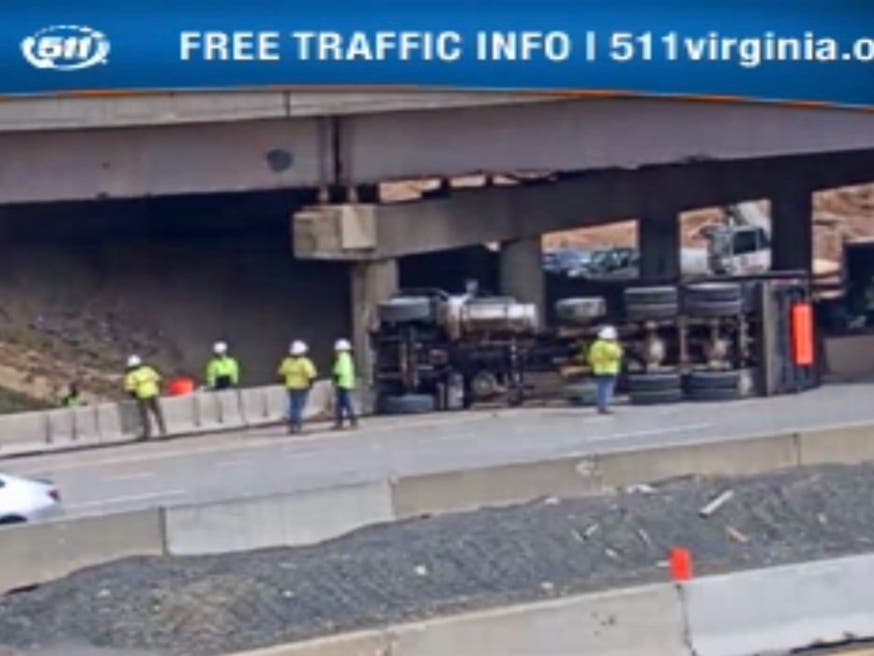 Crews finished clearing an overturned dump truck that blocked two lanes of westbound traffic on Interstate 66 for a couple of hours on Friday. 