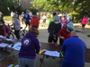 Cyclists sign in and get their paperwork Saturday morning outside the Reston Community Center.